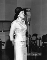 Patsy Cline photo during a recording session in Nashville on display at the Willie Nelson and Friends Museum in Nashville, Tennessee.