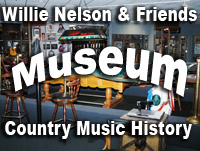 The Martin D-18 guitar played by Willie at his Grand Ole Opry debut on display at the Willie Nelson Museum located in Nashville, Tennessee.