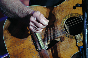Willie Nelson playing his guitar Trigger at Willie's Country Throwdown concert at the Woods of Fontanel in Nashville, Tennessee