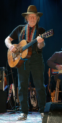 Willie Nelson playing his guitar Trigger at the Ryman Auditorium in Nashville, Tennessee.